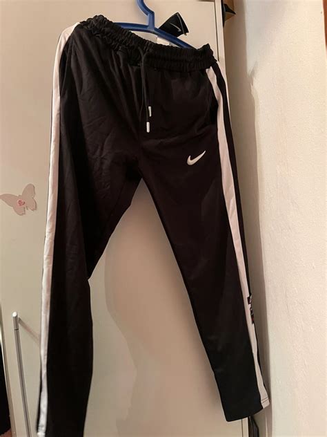 nike hose mit knöpfen an der seite damen